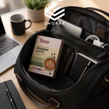 Kotak Enera Spanish Latte berada di dalam beg kerja bersama laptop dan barangan keperluan harian dalam suasana profesional.